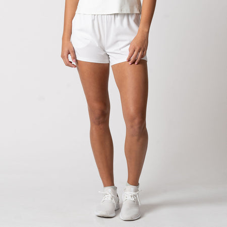 Image of a female model wearing a pair of JOOLA Women's Woven Shorts, White.