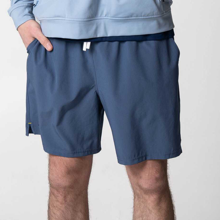 White background, image of a pair of JOOLA Woven Shorts, 7-inch inseam.