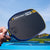 Image of a person holding a JOOLA Dual Signature Kate Fahey and Brooke Buckner Agassi Pro V pickleball paddle.