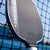 Close up image of the Dual Signature Kate Fahey and Brooke Bucker Agassi Pro V pickleball paddle. Paddle is resting on the net.