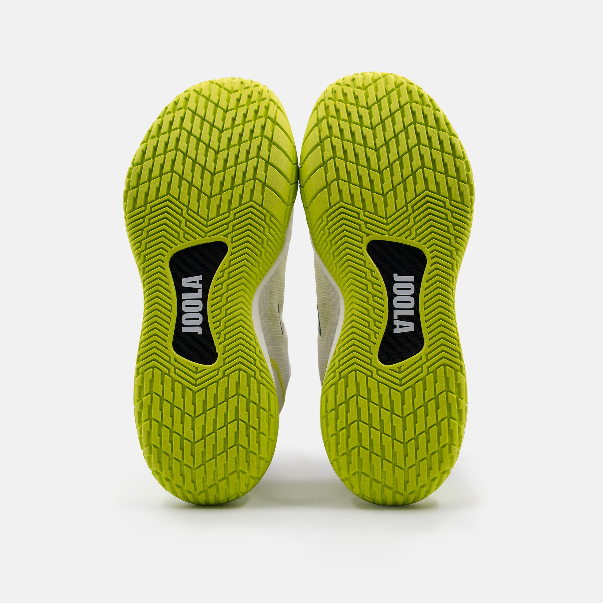 White background, product image of the Men's R4LLy pickleball shoe in lime, white and black colorway. Image shows the tred and finber carbon shank on the bottom of the shoe.