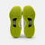 White background, product image of the Men's R4LLy pickleball shoe in lime, white and black colorway. Image shows the tred and finber carbon shank on the bottom of the shoe.