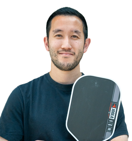 Image of JOOLA pro David Yahng holding a JOOLA Pereus Pro IV.