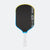 Pickleball paddle with black face, blue rim, and white handle on a white background.