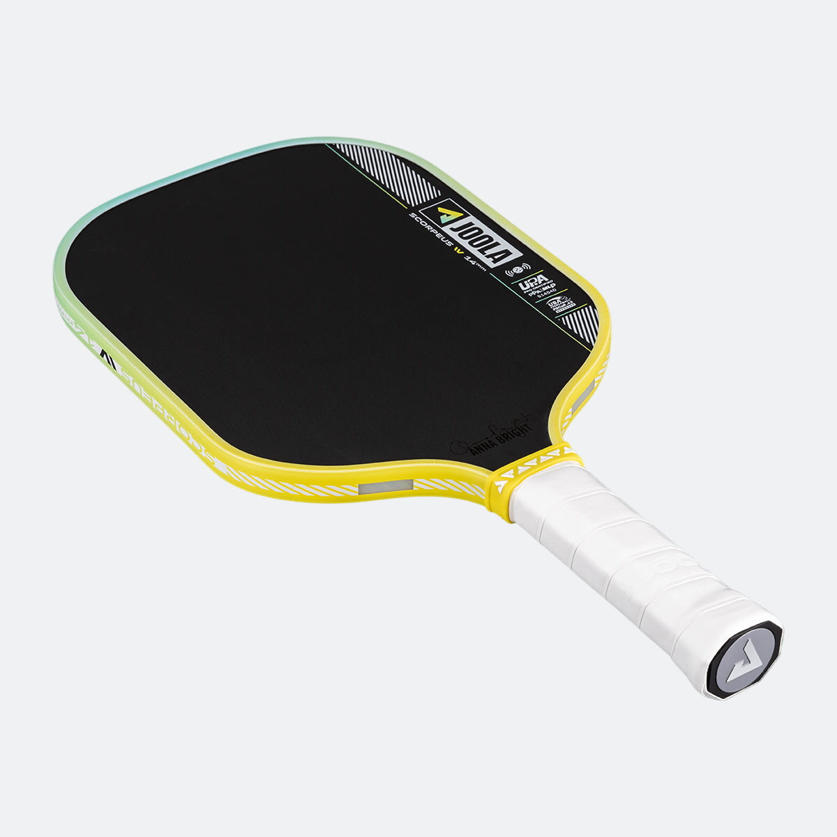 Yellow and black pickleball paddle on a white background.