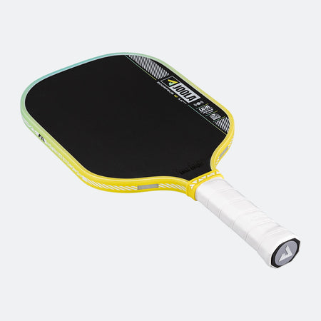Yellow and black pickleball paddle on a white background.