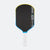 Pickleball paddle with black face, blue rim, and white handle on a white background.