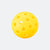 Yellow perforated pickleball on a white background.
