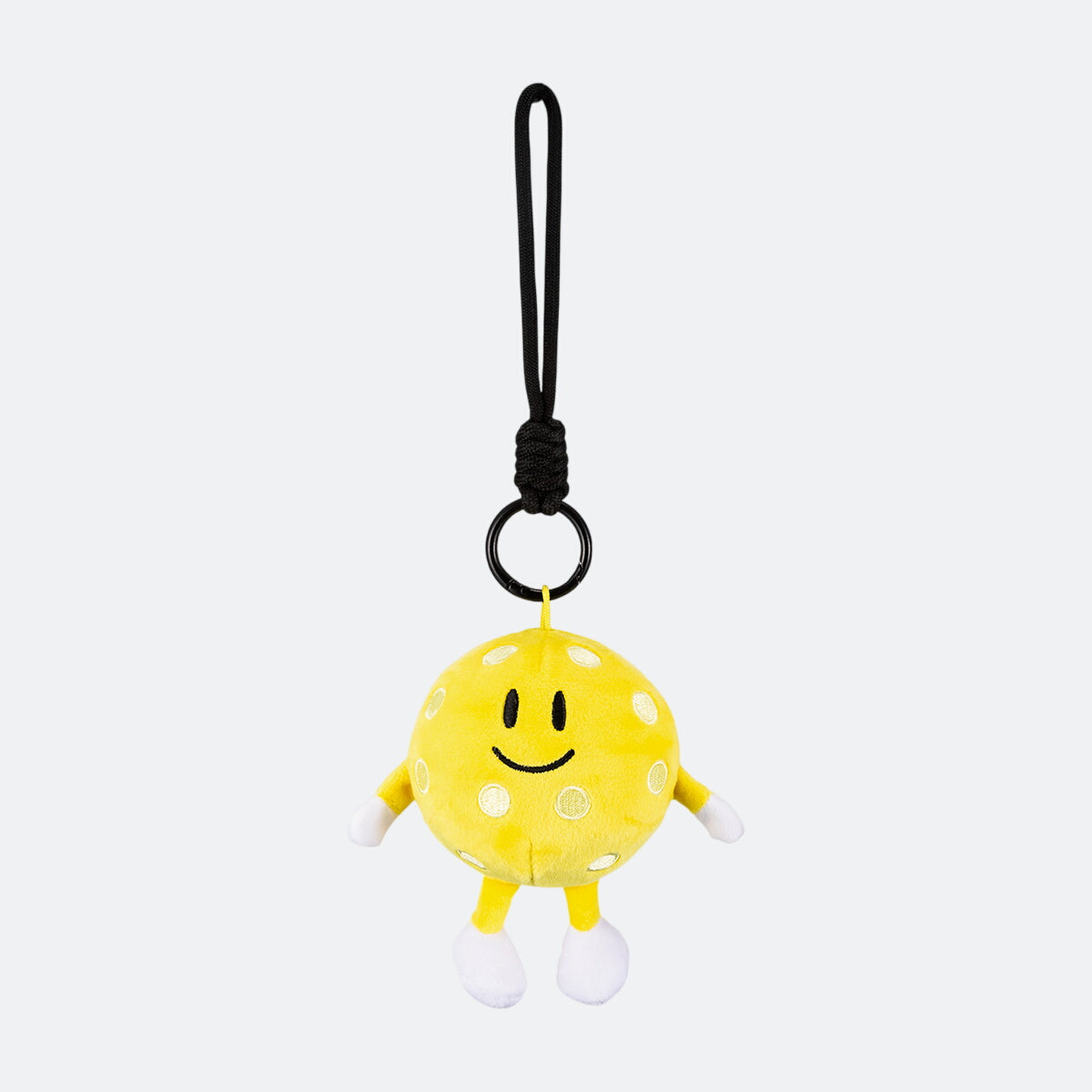 Image of JOOLA's pickleball plushie, showing his smiling face.