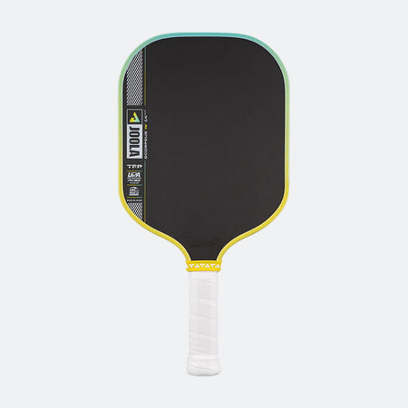 Pickleball paddle with black paddle face, yellow rim, and white handle on a white background.