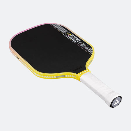Yellow and black pickleball paddle with white handle on a white background.