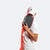 White and pink gradient background, image of JOOLA Pro Ben Johns holding a Perseus Pro IV over his face. 