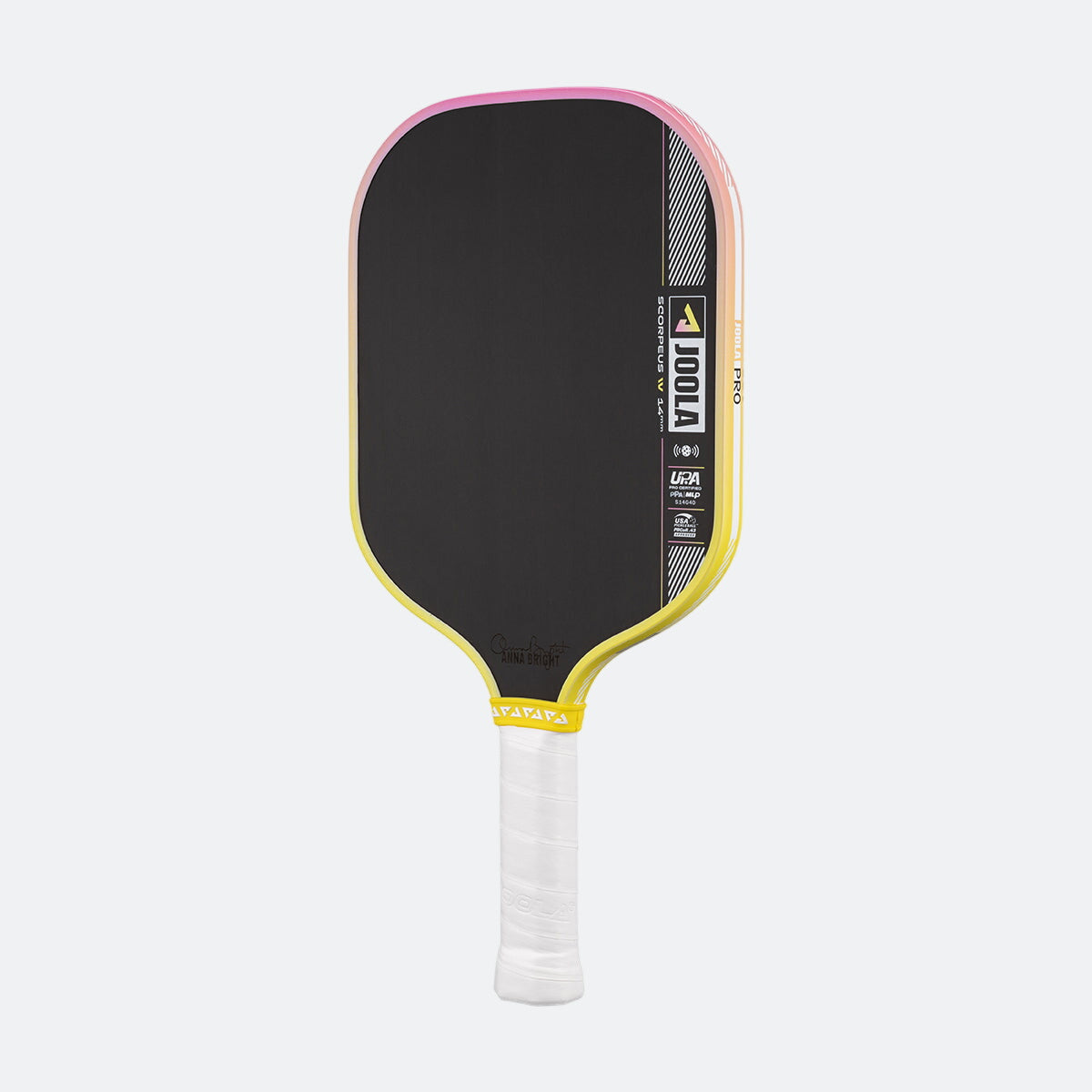 Pickleball paddle with black face, yellow rim, and white handle on a white background.