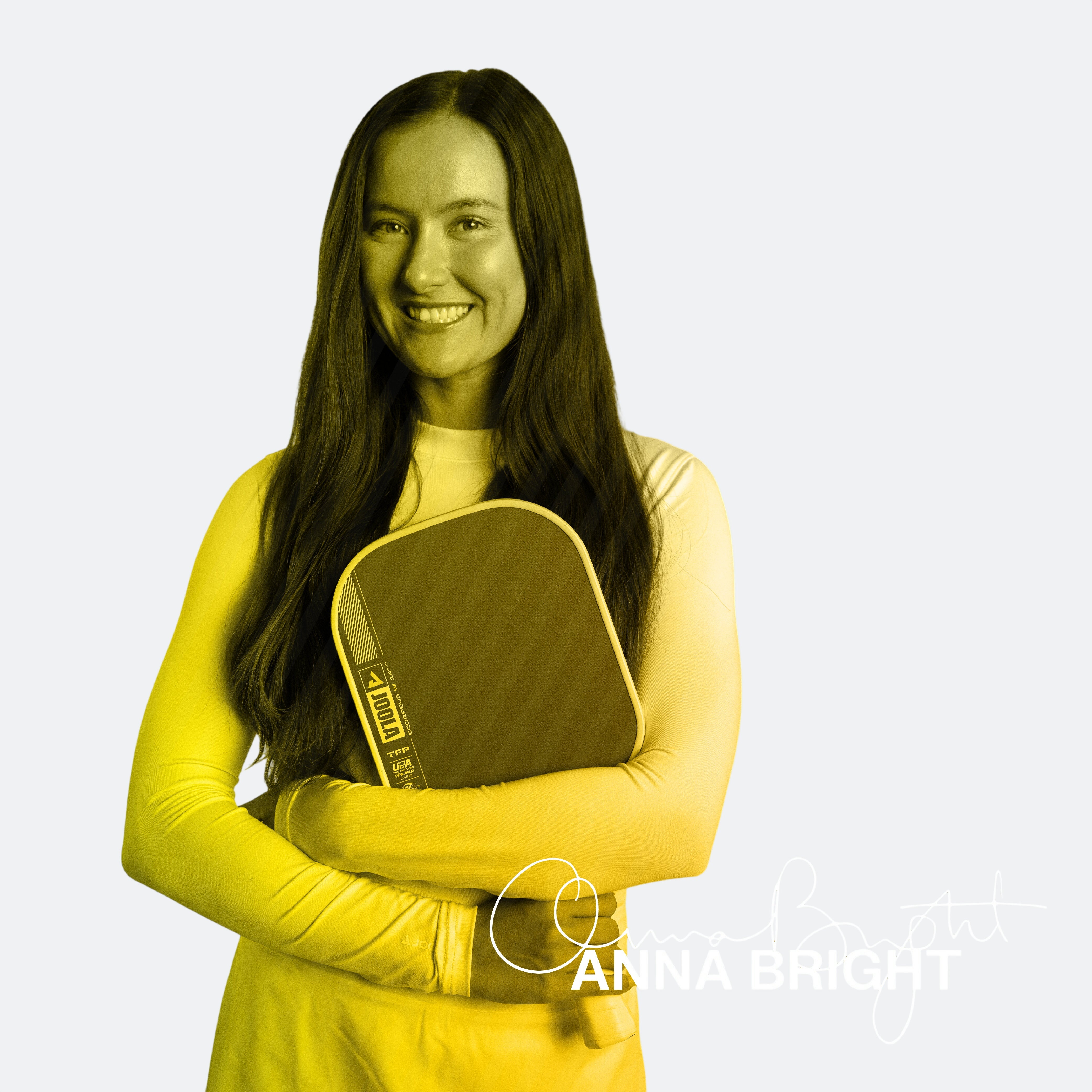 Anna Bright holding a pickleball paddle with 'Scorpeus' branding and 'Anna Bright' signature on a yellow and black gradient background.