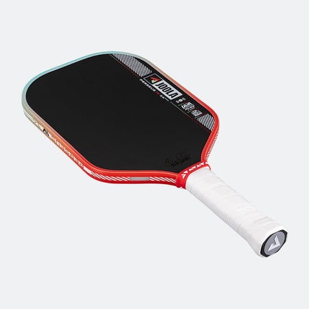 Pickleball paddle with red and black design on a white background