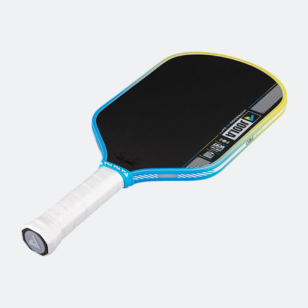 Pickleball paddle with black playing surface, blue rim, and white handle on a white background.