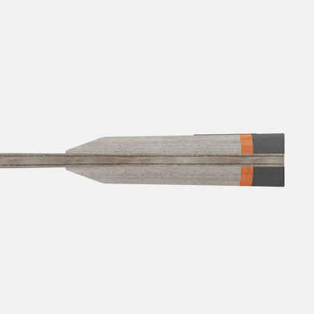 JOOLA BASEline Carbon Handle Wooden table tennis racket with a black and orange grip on a white background.