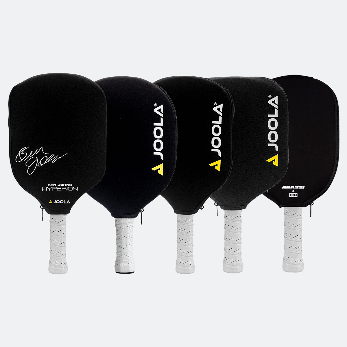 White background, five different versions of JOOLA Neoprene pickleball paddle covers.