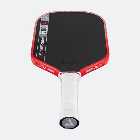 Red and black pickleball paddle with white handle on a white background