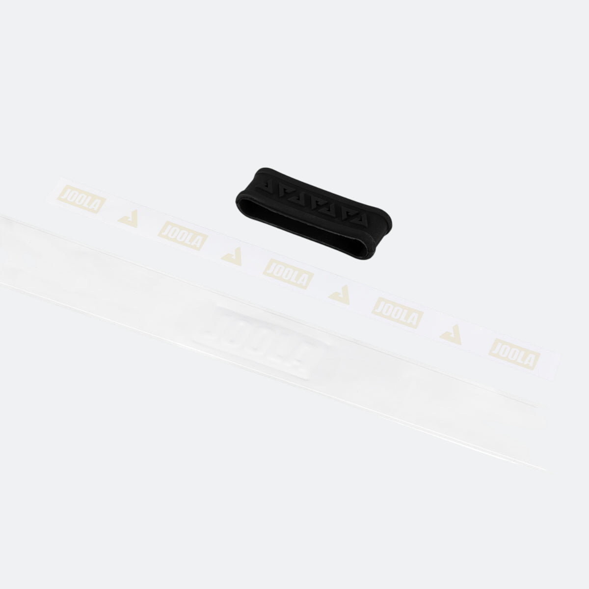 White background, image of the contents of a package of JOOLA feel-tec pure grip rolled out with a black JOOLA rubber band.