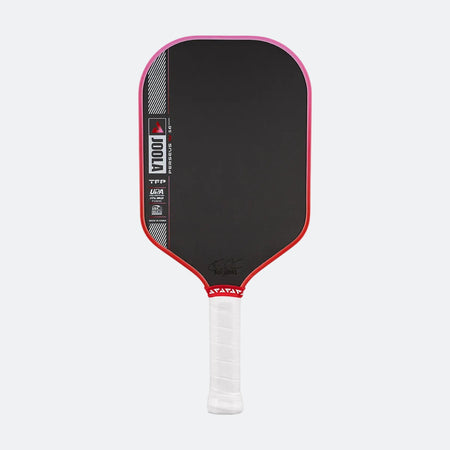 Pickleball paddle with black surface, red border, and white handle on a white background