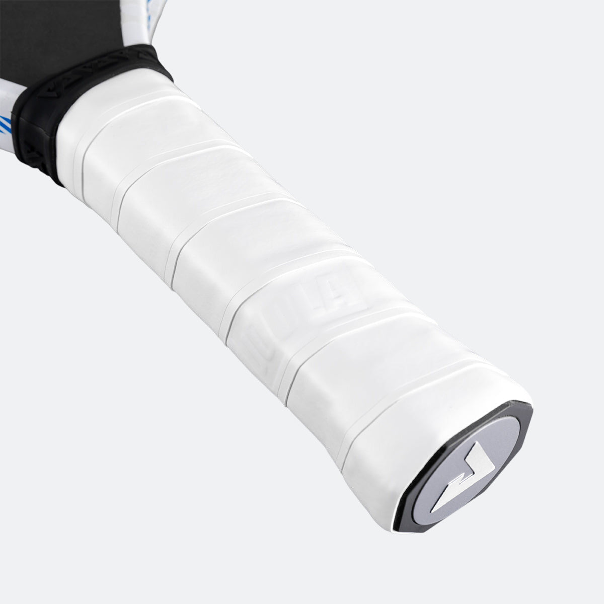 White background, close up image of the JOOLA White fel-tec pure replacement grip applied to a JOOLA pickleball paddle.