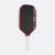 Pickleball paddle with black face, red border, and white handle on a white background