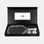 Pickleball paddle and ball set in a black box with a visible brand logo.