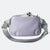 Light purple JOOLA Belt bag with a phone inside on a white background