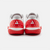 White background, product image of the JOOLA Women's R4LLy pickleball shoe, red and white colorway, image show the detail on the back of the shoe.